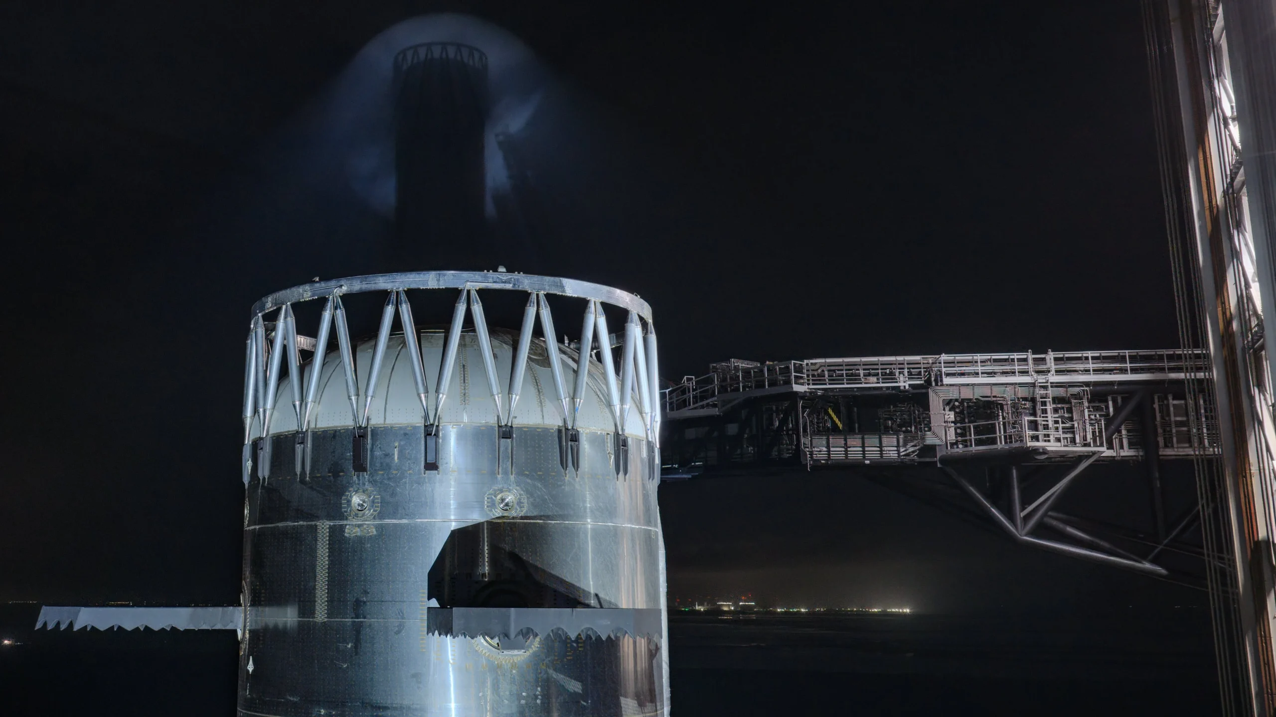 Super Heavy booster at Starbase, showcasing the massive welded structure